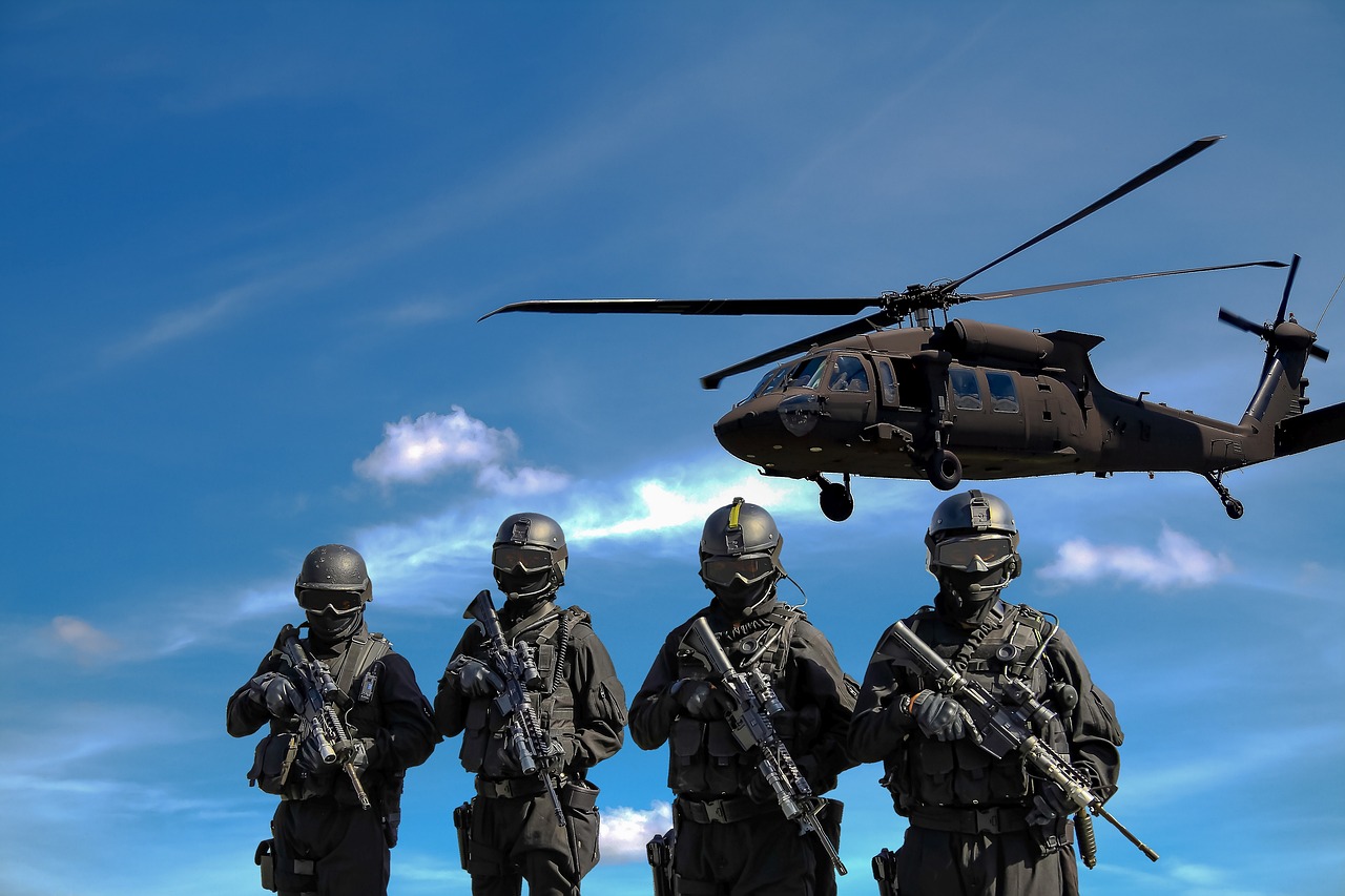 Military forces and helicopter.